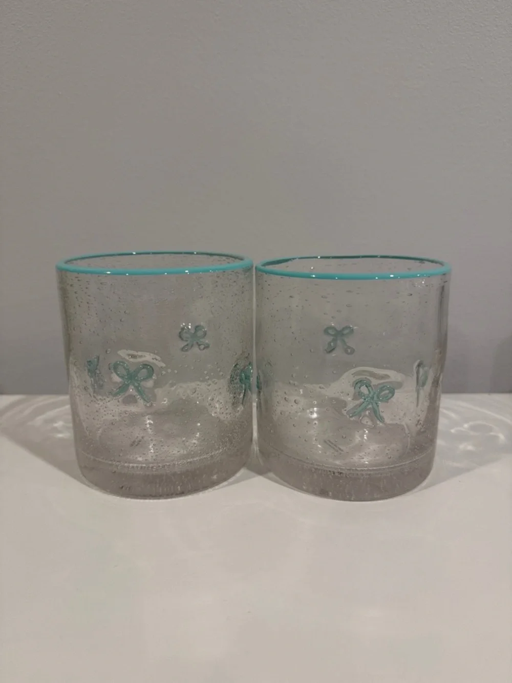 Set of 2 Hand-Blown Clear Glass Tumbler Set with Aqua Trim and Bows